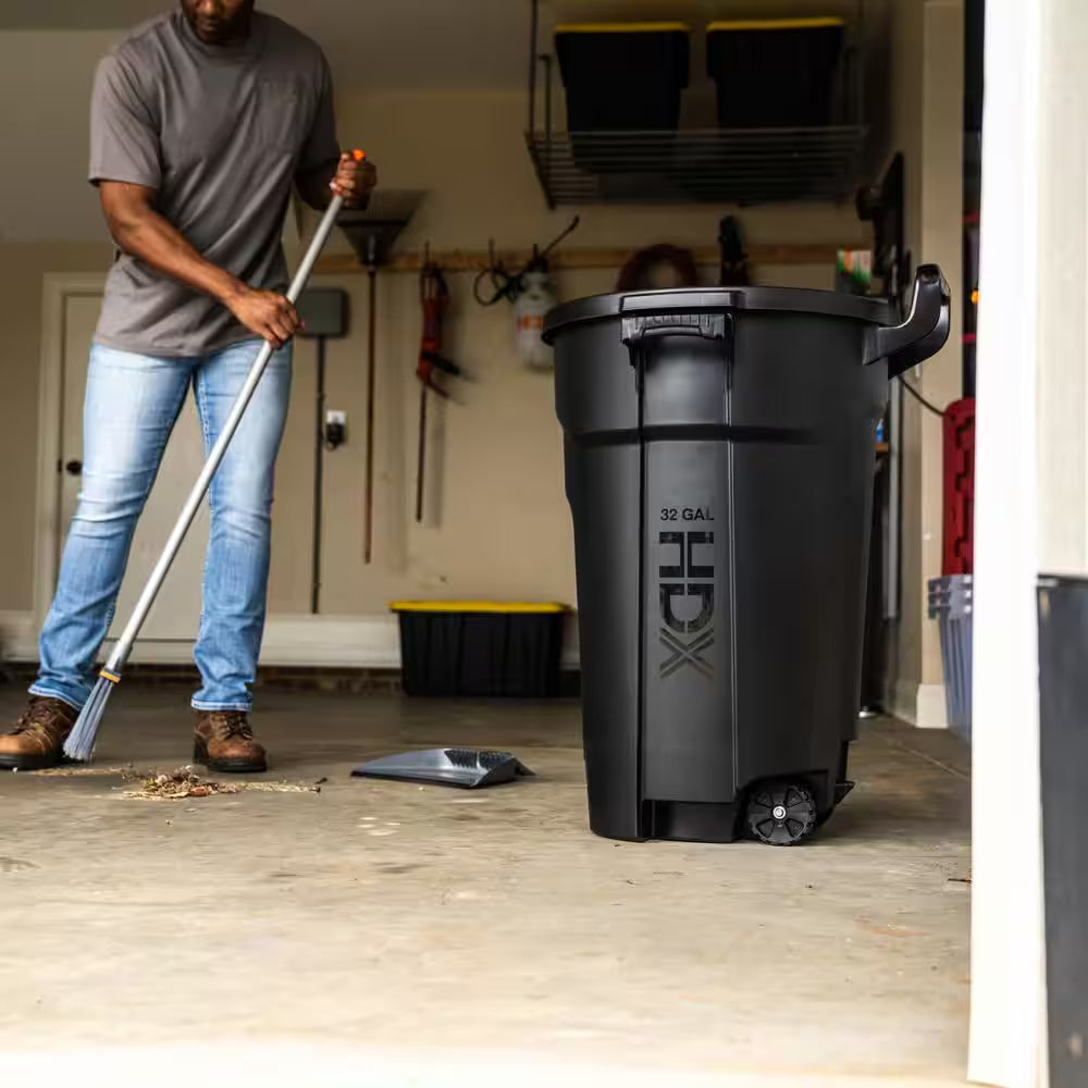 32 Gal. Black Outdoor Vented Trash Can with Wheels, Domed Lid, Rounded Handles, and Reinforced Foothold