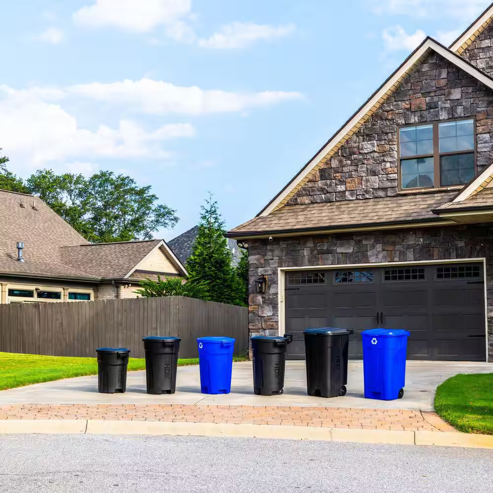 32 Gal. Black Outdoor Vented Trash Can with Wheels, Domed Lid, Rounded Handles, and Reinforced Foothold
