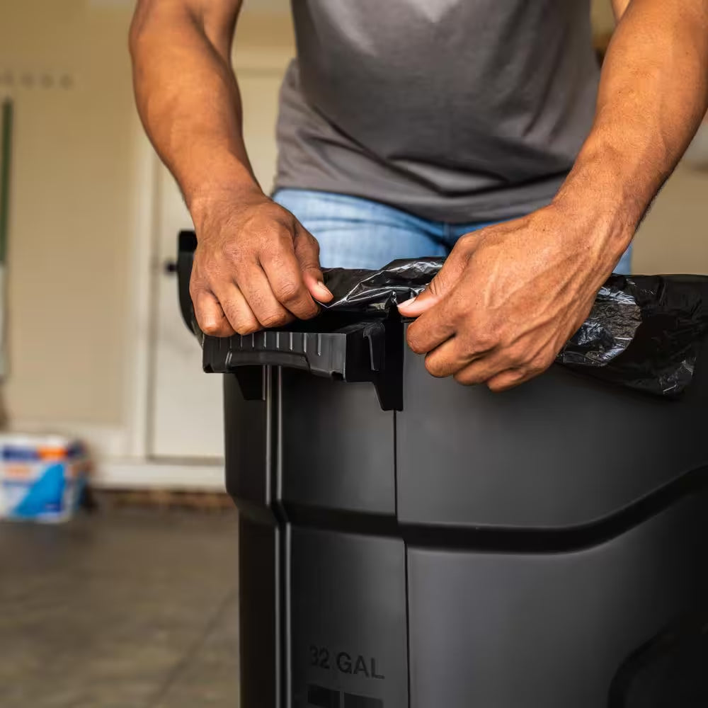 32 Gal. Black Outdoor Vented Trash Can with Wheels, Domed Lid, Rounded Handles, and Reinforced Foothold