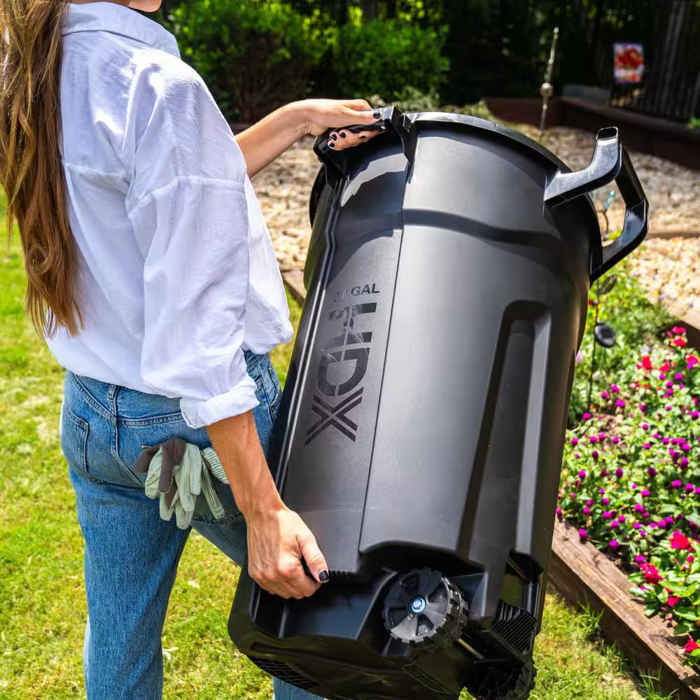 32 Gal. Black Outdoor Vented Trash Can with Wheels, Domed Lid, Rounded Handles, and Reinforced Foothold