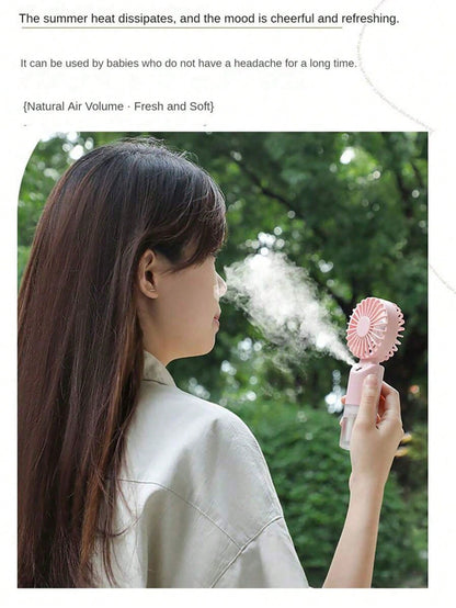 Mini Handheld Mist Fan – Portable Rechargeable Cooling Fan with Humidifying Spray