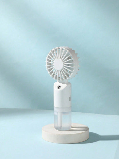 Mini Handheld Mist Fan – Portable Rechargeable Cooling Fan with Humidifying Spray